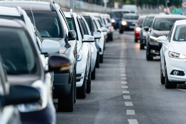 depositphotos_448936232-stock-photo-many-cars-travelling-road